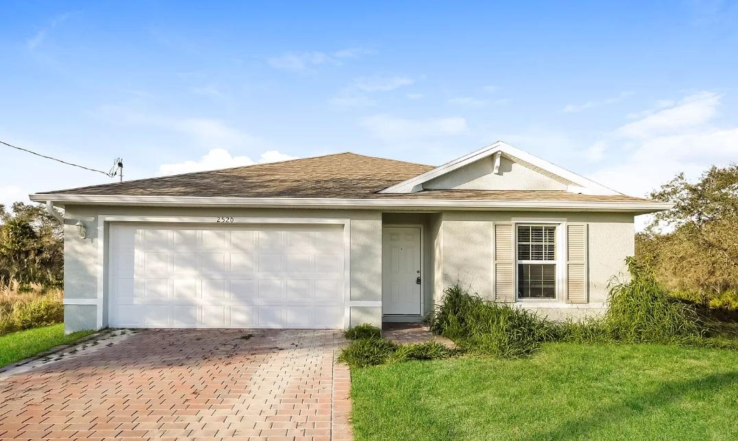 Photo of property: 2520 71st St W, Lehigh Acres, FL 33971